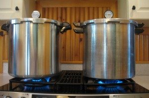 Two pressure canners on the stove